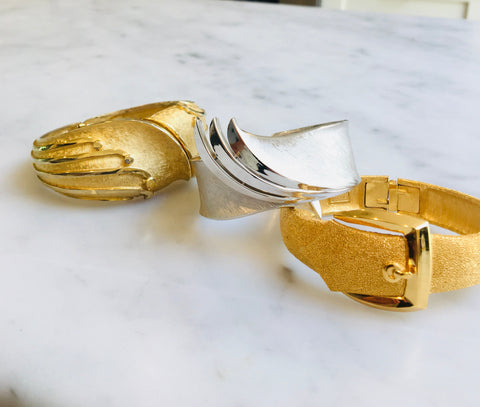 Stunning vintage and vintage reimagined bracelets in gold and silver.