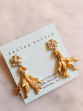 Gorgeous organic shaped coral branch earrings circa 1950s with stunning baguette posts.
